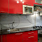 Фото - Скинали из стекла для красной кухни  от KenazGroup.pro