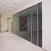 Фото - Перегородка цельностеклянная из затемненного стекла  от KenazGroup.pro